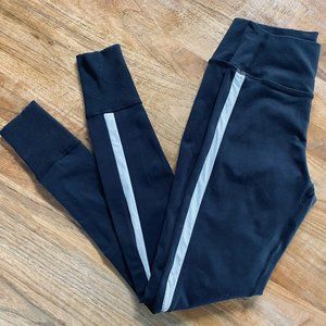 Splits59 leggings in black with white side stripes